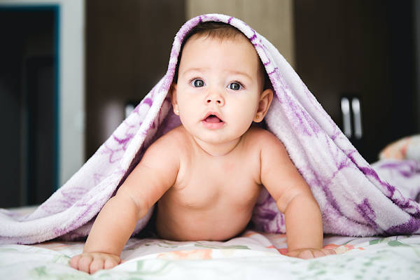 A baby enjoying Tummy Time